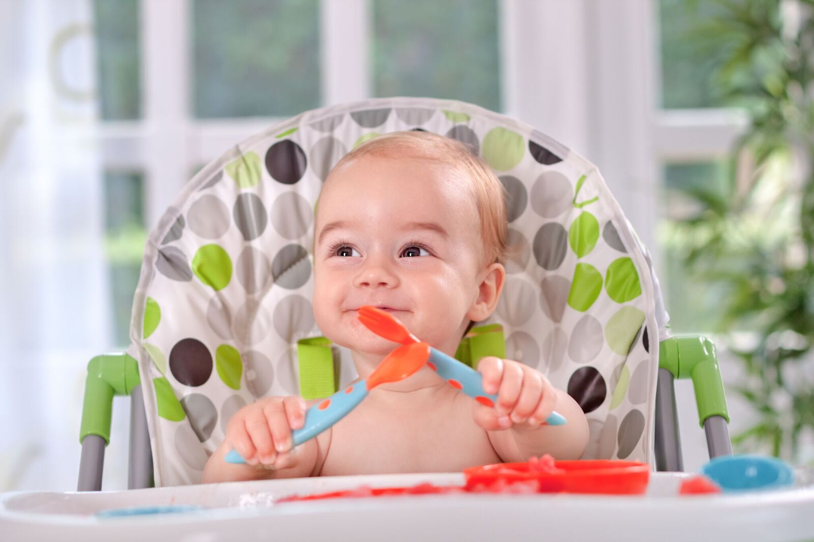 When do babies clearance use utensils